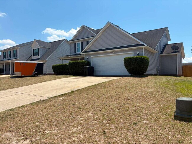 Building Photo - Spacious 4-Bedroom Sanctuary with Cozy Fireplace on Chimney Swift Drive!