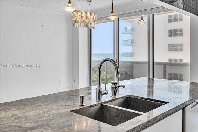 Building Photo - 9559 Collins Ave