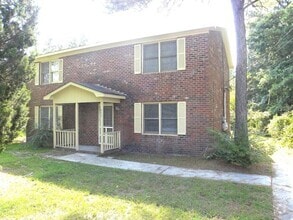 Building Photo - Two story duplex home! feels private like ...