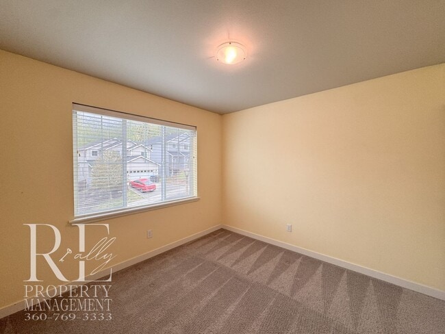 Building Photo - Vaulted Ceilings, Tree-Lined Views & a Spacious Primary Suite Retreat