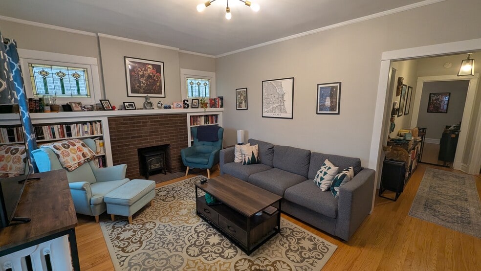 Living room with hallway in the back - 2176 W Windsor Ave