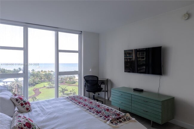 Building Photo - 10275 Collins Ave
