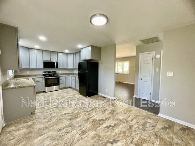 Building Photo - 6005 Blairmore Pl