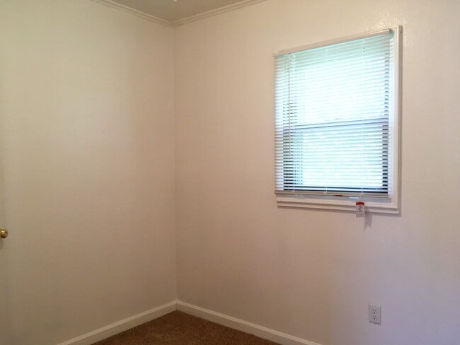 Building Photo - Pet Friendly 3 Bedroom Charmer located beh...