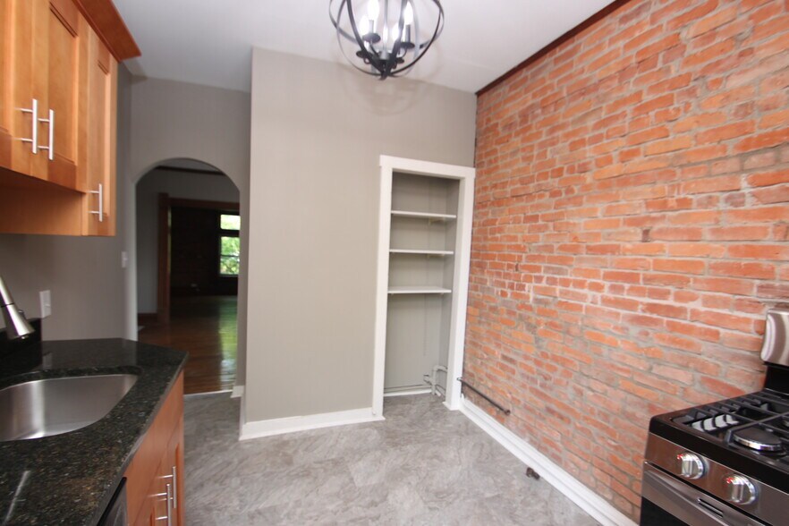Exposed brick walls - 239 E Whittier St