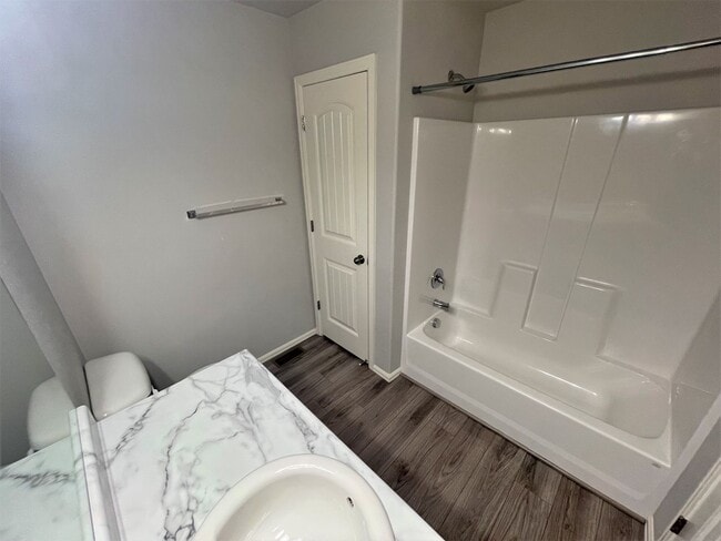 Building Photo - Townhome w/ 2 car garage, A/C-Newer, Low Maintance, & Conviniently Located