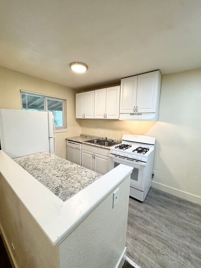 Building Photo - Move-In Special; Upstairs One Bedroom + Private Patio – SEE VIDEO