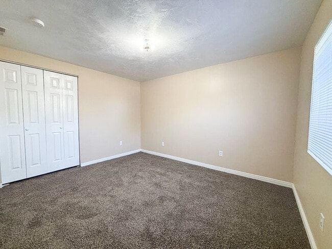 Building Photo - Spacious 5-Bedroom Home in Stansbury Park ...