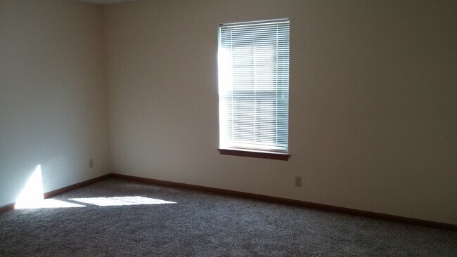 Building Photo - Spacious 2-Bed, 2-Bath Duplex with Attache...