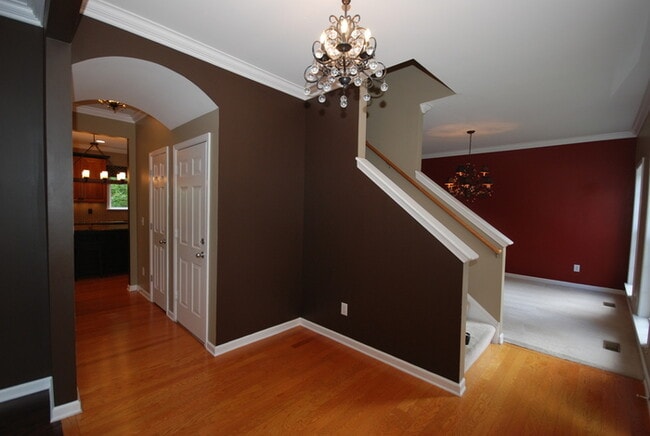 Building Photo - Oversized Executive Style Home with Finish...