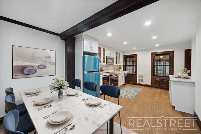 Building Photo - Timelessly Renovated Historic Triplex with...
