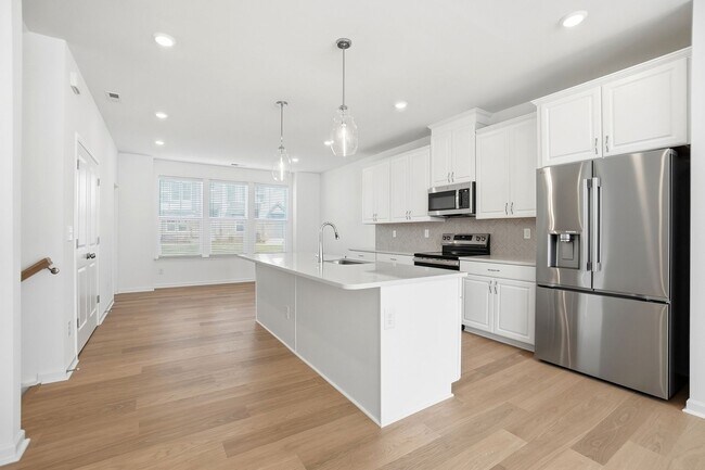 Building Photo - Brand-New Townhome in the University area at Senata at Research Park!
