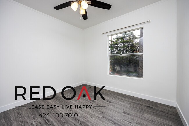 Building Photo - Spacious One Bedroom on Picturesque Ground...