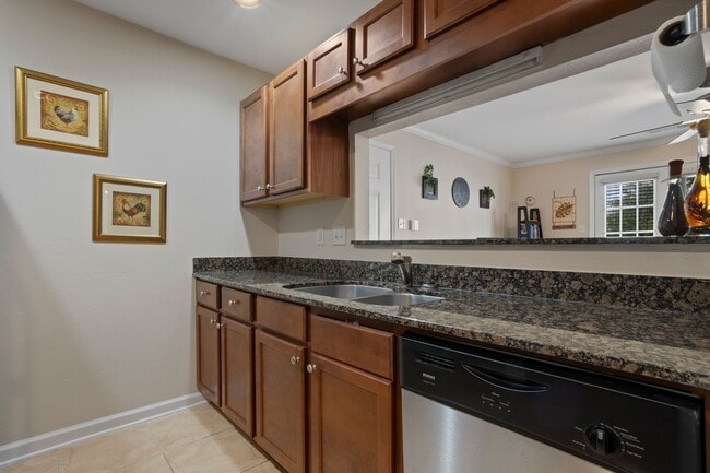 Building Photo - WATERFRONT LIVING! BEAUTIFULLY APPOINTED CONDO ON THE BAYOU IN OS SCHOOL DIST - FULLY FURNISHED