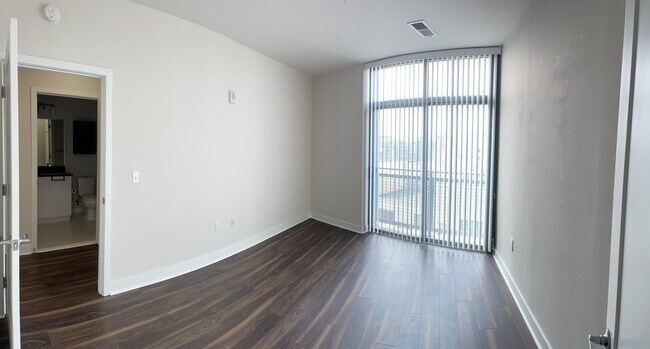 Bedroom with balcony - 460 New York Ave NW