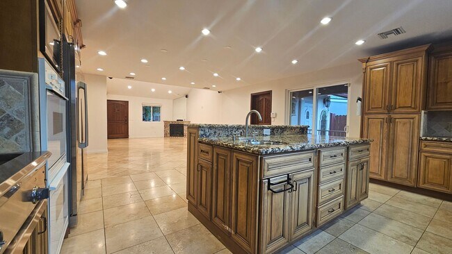 Building Photo - Exquisite 4 Bedroom + Office Single-Level Residence with Pool/BBQ in a Prime South-of-the-Bouleva...