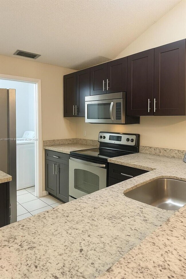 Building Photo - 6822 SW 39th St, 14G