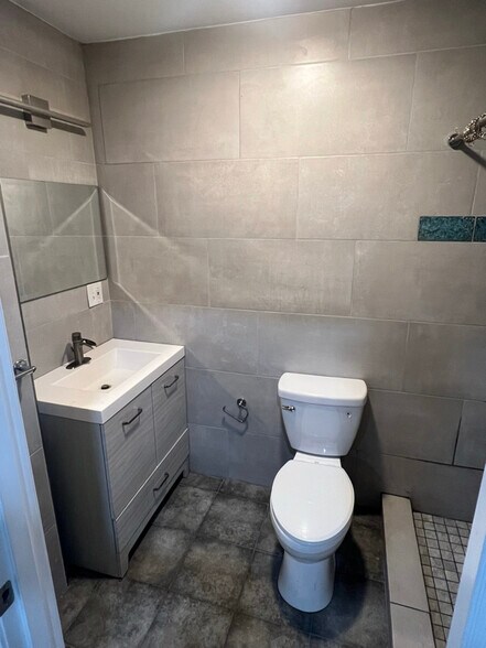 Building Photo - 7038 Woodland Ave