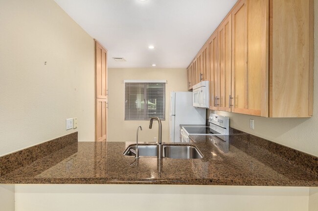 Building Photo - Remodeled 2-Bedroom, 2-Bath Condo in Prime...