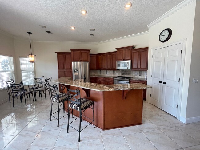 Building Photo - For Lease - 3 BR|2.5 BA w/ In-ground Pool in Palm Bay!