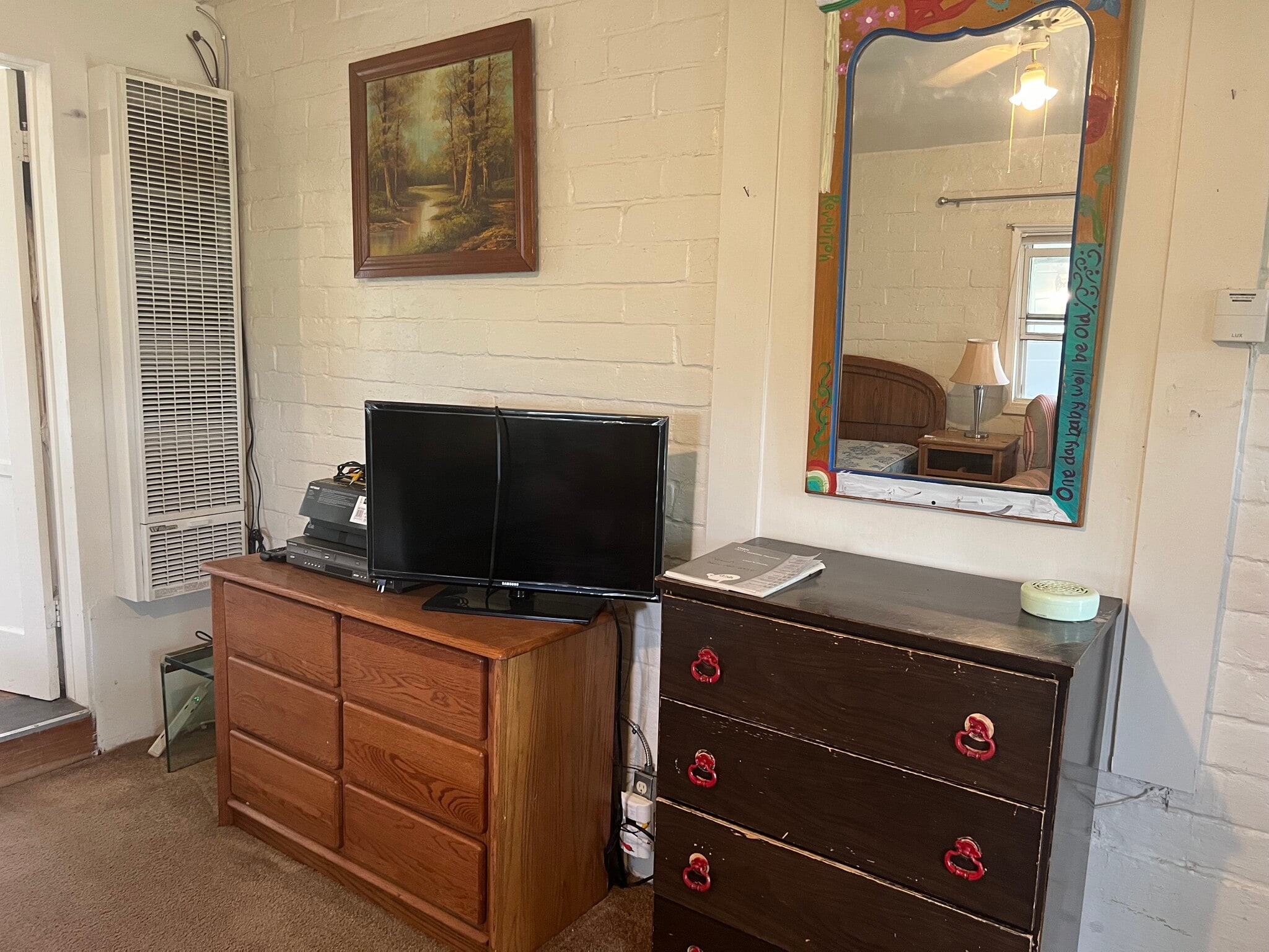 Wall gas heater and what you could add in front of the full size bed. Now it is not decorated - 131 Crowley Lake Dr