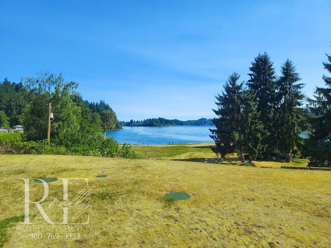 Building Photo - Waterfront Views & Peaceful Living – 2BR w...
