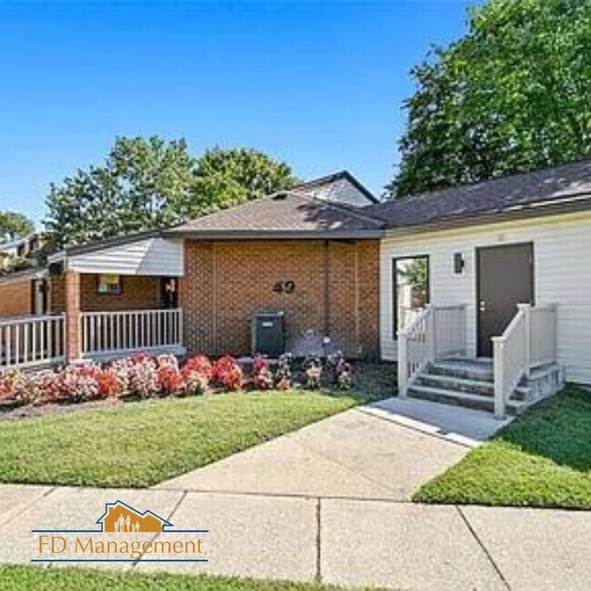 Building Photo - Modern First-Floor with Private Patio in Hampton Club
