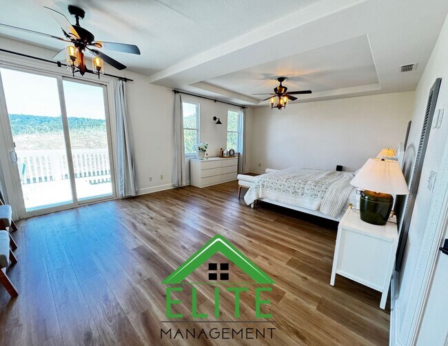 Building Photo - Scenic View Balcony and Beautiful 4-Bedroo...