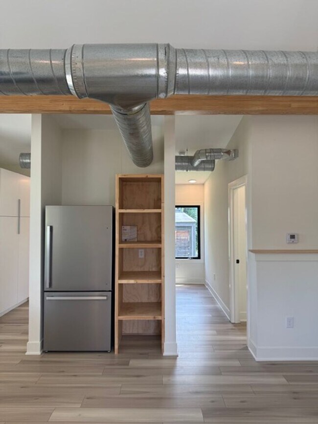 Building Photo - Vaulted Ceilings & Hardwood Floors in This Charming Indianapolis L