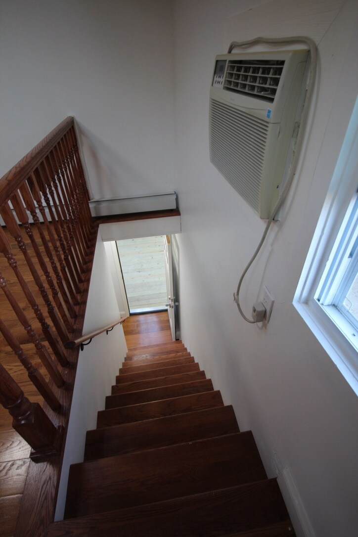Stairs to garage or outside area - 321 Central Ave