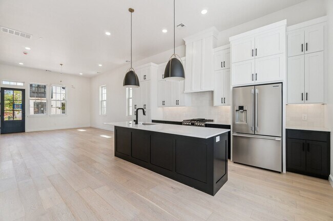 Building Photo - Minimalist Magic: 2-Bed Apartment Over Sel...