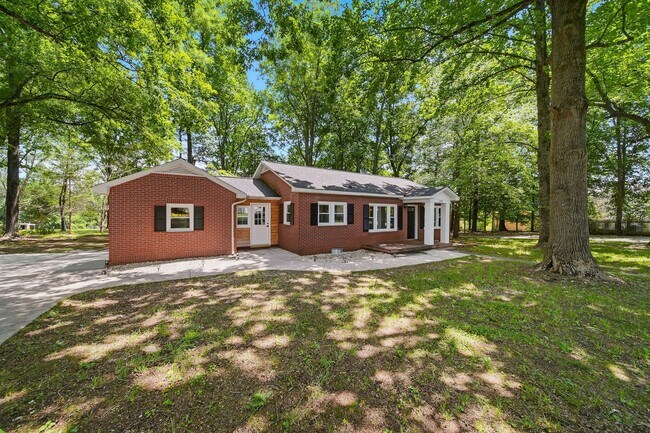 Building Photo - Serene 3BR Ranch with Spacious Yard & Updated Interiors