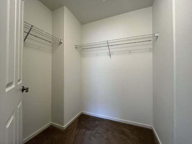Building Photo - Beautiful 2 Bedroom Townhome with Walk-In Closets Private Deck & Attached Garage