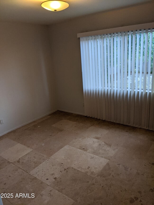 Building Photo - 6307 E Gelding Dr