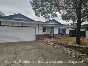 Building Photo - Spacious 3-Bedroom House with Gated Pool i...