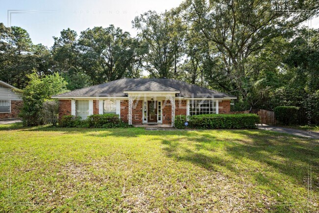 Primary Photo - 3/2 Brick Home with Sunroom, Deck, and Car...