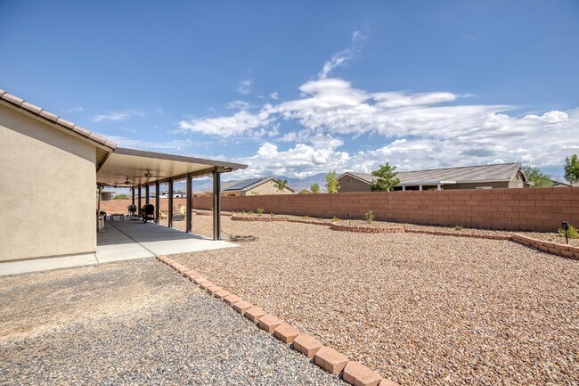 Building Photo - Spacious 4BD/3BA Pahrump Home w/ Dual Prim...