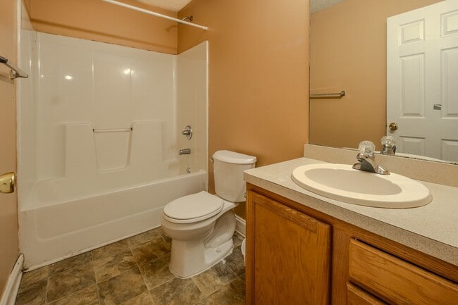 Building Photo - Spacious 4BR/3BA Townhome | Pet Friendly | Washer & Dryer Included | $1,600/mo