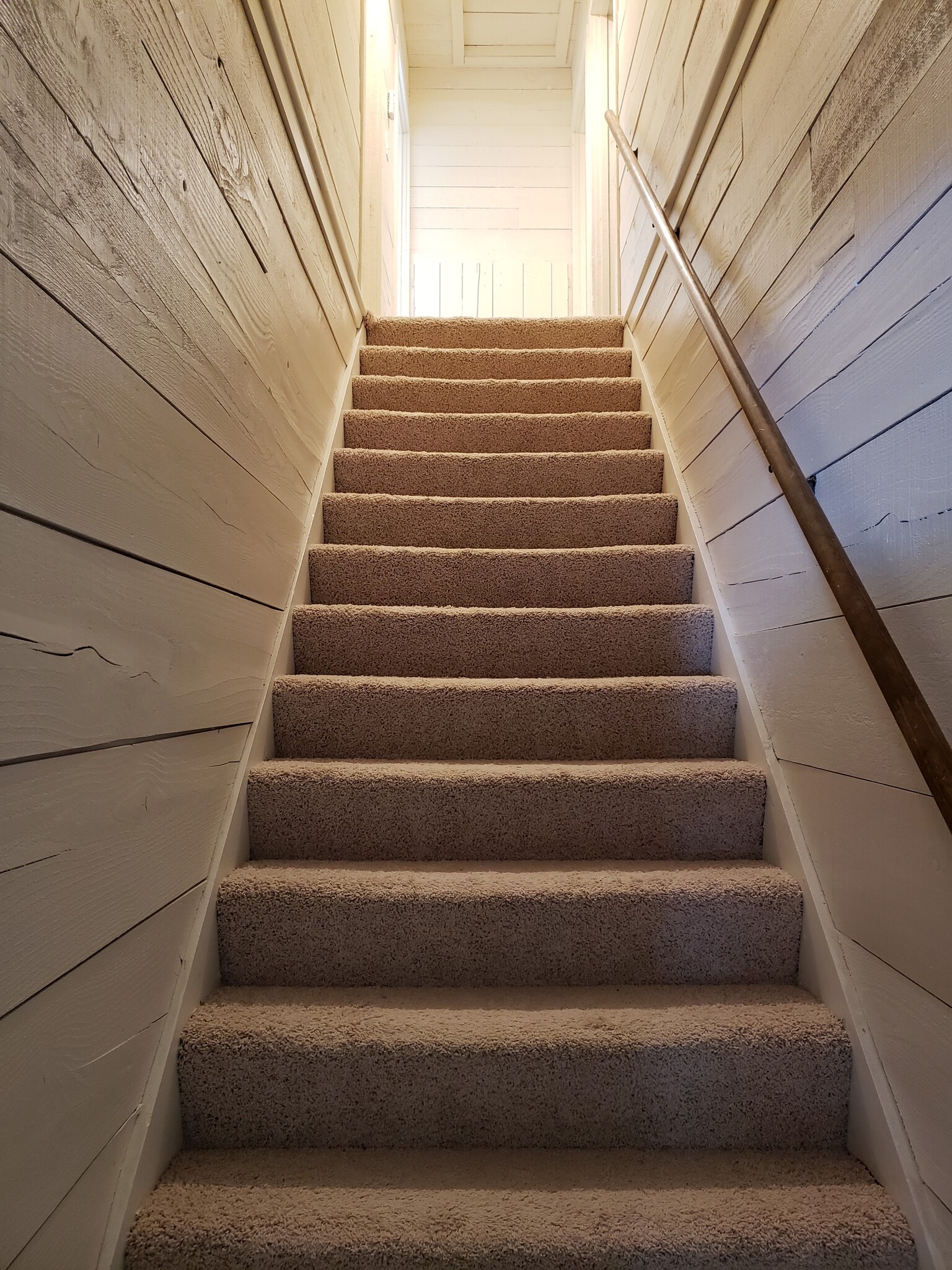 Stairs to upper rooms - 454 W Wisconsin Ave