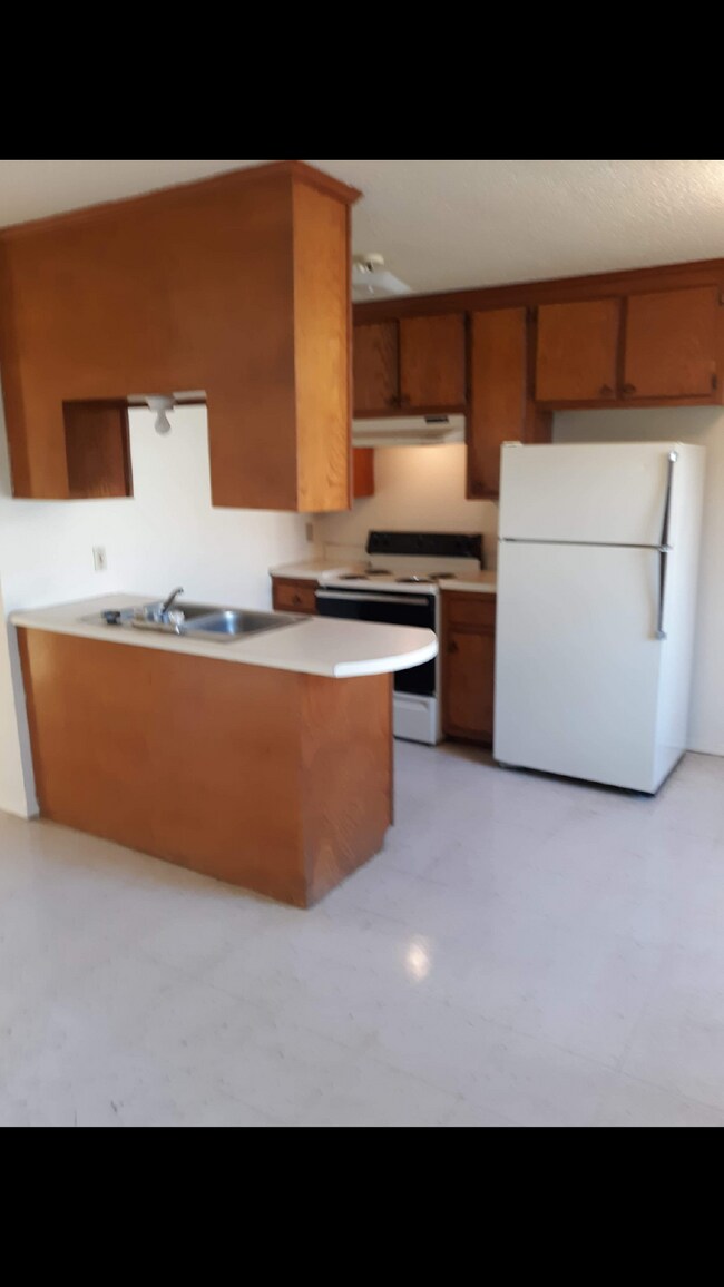 Building Photo - "Charming 2-Bedroom Retreat in Bono – Cozy 710 Sq. Ft. Apartment Awaits!"