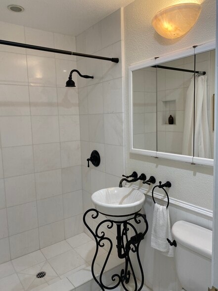Bathroom. Sink has been replaced with vanity. - 1845 Anaheim Ave