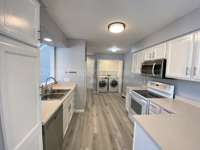 Building Photo - 1210 E 130th Ave