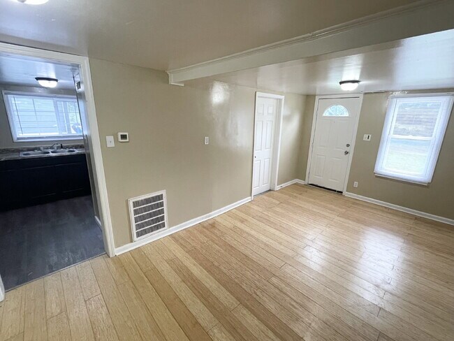 Building Photo - 2 Bedroom with huge, attached garage/workshop combo (has electricity)