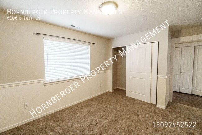 Building Photo - 6106 E 14th Ln