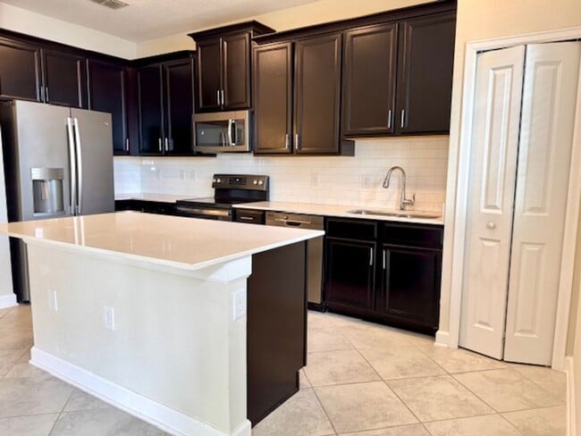 Building Photo - For Rent in ChampionsGate 3/2.5 Townhouse with Water View