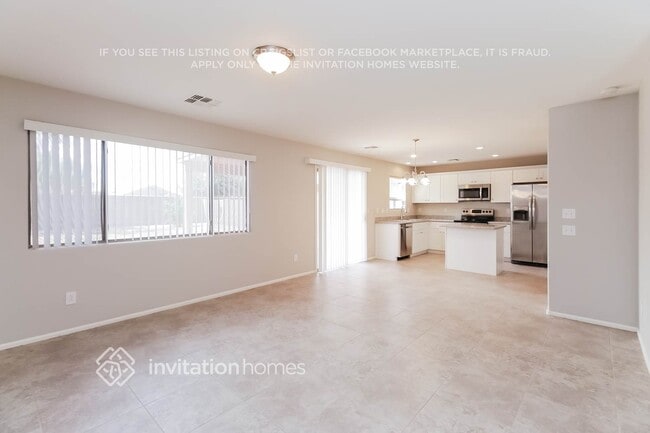 Building Photo - 42575 W Sunland Dr