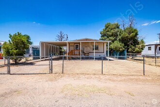 Building Photo - LARGE LOT...FULLY FENCED.
