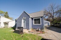 Building Photo - Fenced Yard, 2-Car Garage + Internet Included