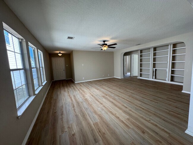 Building Photo - NEW PAINT, FLOORING, APPLIANCES & ROOF  | ...