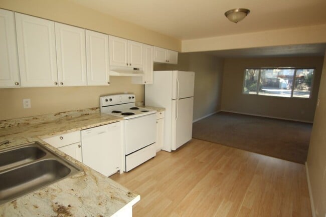 Building Photo - Beautifully Renovated 2 Bedroom 1-Bath Apartment – Private Patio • Downstairs Unit • Prime Location